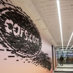 wall with cars.com logo
